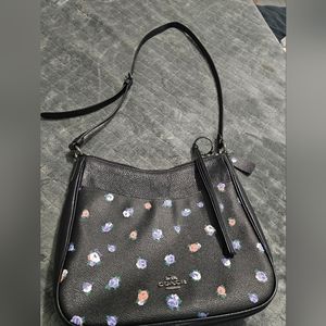 Black with flowers coach purse gently used